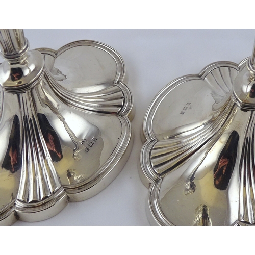 3 - A pair of George III style hollow silver candlesticks, Birmingham 1956.  700gr / 307mm (by instructi... 