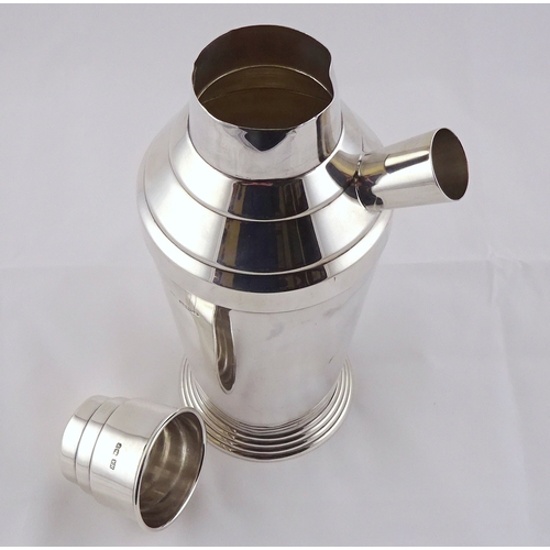 5 - An Art Deco influence silver cocktail shaker, Sheffield 1934.  660gr / 255mm tall.  a/f minor dents ... 