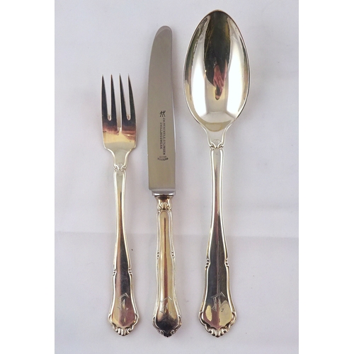 70 - A part canteen of German white metal cutlery, 800 grade, comprising 12 table forks, 12 table knives ... 