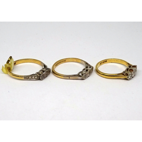 111 - Three trilogy rings comprising small white stones in yellow and white metal settings marked 18ct & P... 
