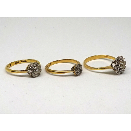 129 - Three cluster rings, yellow and white metal marked 18ct set with small brilliant cut white stones. (... 