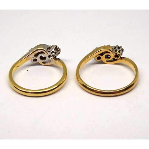 137 - Two trilogy twist rings, one 18ct gold & platinum, one yellow metal marked 18ct & Plat, both set wit... 