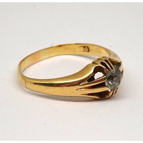 144 - A gentleman's solitaire ring comprising a brilliant cut white stone in a claw setting, yellow metal ... 