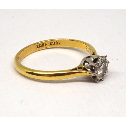 145 - A solitaire ring comprising a brilliant cut white stone in an enclosed claw setting, yellow and whit... 