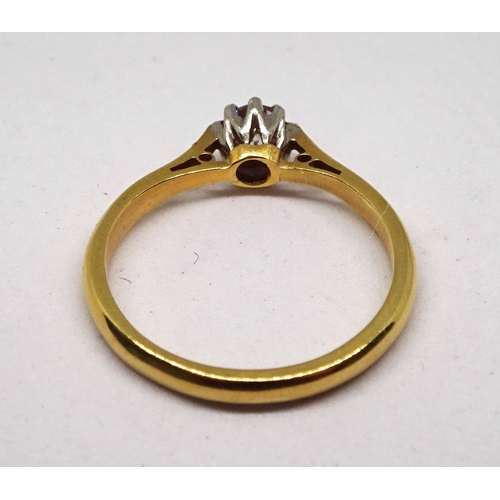 147 - A solitaire ring, comprising a brilliant cut white stone in a white metal claw setting, yellow metal... 