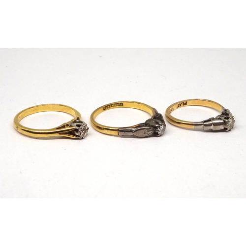 155 - Three various solitaire rings, yellow and white metal set with brilliant cut white stones. (by instr... 