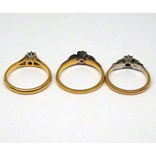 155 - Three various solitaire rings, yellow and white metal set with brilliant cut white stones. (by instr... 