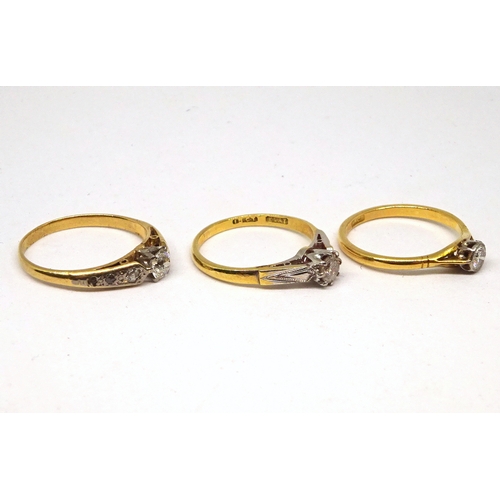 165 - Three various solitaire rings, yellow metal set with brilliant cut white stones. (by instruction of ... 