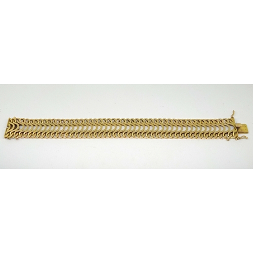 81 - A ribbon bracelet of waved link design, yellow metal indistinctly marked including a hexagonal 461 m... 