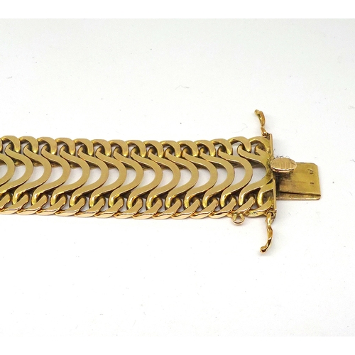 81 - A ribbon bracelet of waved link design, yellow metal indistinctly marked including a hexagonal 461 m... 