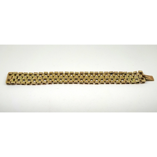82 - A ribbon bracelet of box link design arranged in a geometric pattern, yellow metal marked 9ct, a/f. ... 