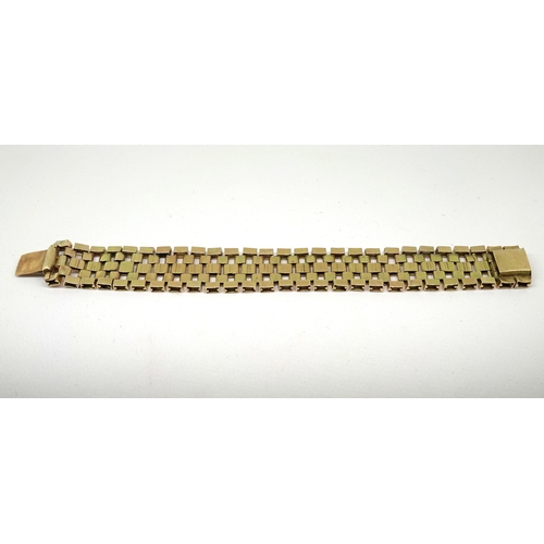 82 - A ribbon bracelet of box link design arranged in a geometric pattern, yellow metal marked 9ct, a/f. ... 