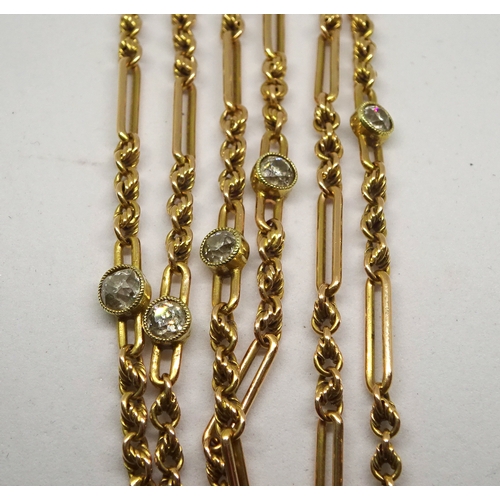 84 - A watch chain, yellow metal marked 15ct of mixed chain link design set with ten old cut white stones... 
