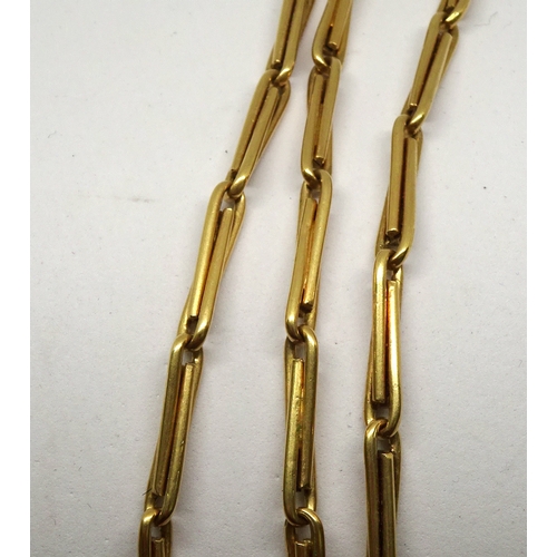 85 - A watch chain, unmarked yellow metal of long 