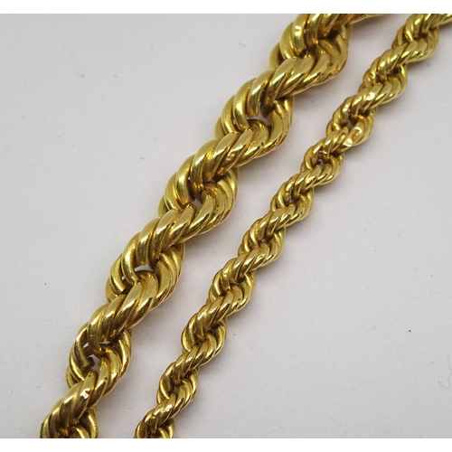 87 - A hollow link rope twist necklace, unmarked yellow metal.  445mm long. (by instruction of the family... 