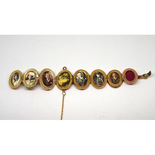 96 - An egg-shaped concertina photograph locket bearing presentation inscription to front dated 1916 / 19... 