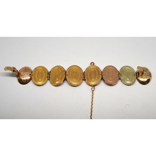 96 - An egg-shaped concertina photograph locket bearing presentation inscription to front dated 1916 / 19... 