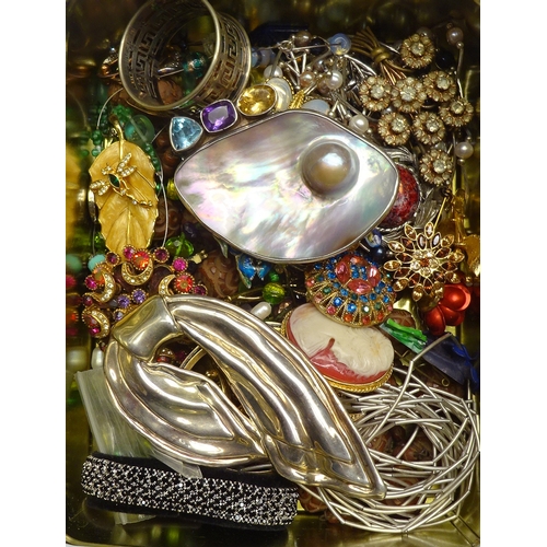 257 - A Charles Albert brooch comprising mother of pearl with coloured gemstones and blister pearl, 80mm w... 