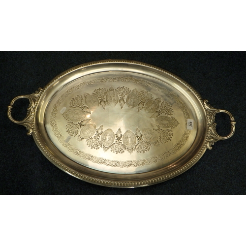268 - A silver plated two handled tray, 76 cm wide.