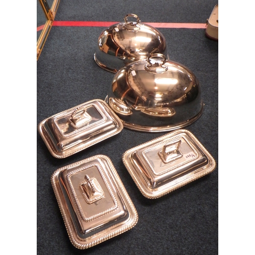 285 - A graduated pair of silver plated meat domes; a pair of silver plated entree dishes and another simi... 