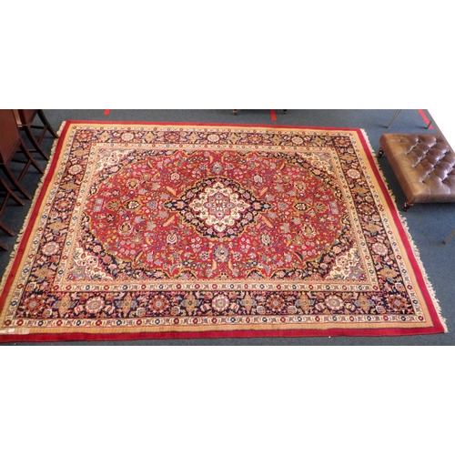 1008 - A Persian Kerman rug with floral medalion design 358 x 257 cm