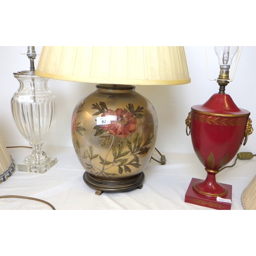 92 - A glass table lamp together with a painted metal lamp and a large painted glass lamp (3).