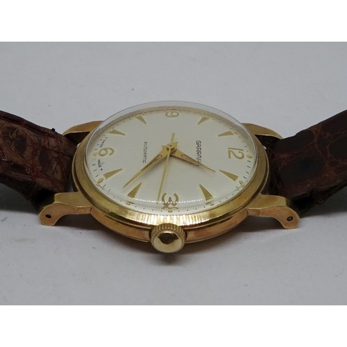 350 - A Garrard wristwatch having an automatic movement in a 9ct gold case with a screw-down solid back, b... 