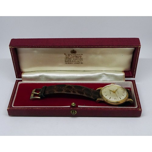 350 - A Garrard wristwatch having an automatic movement in a 9ct gold case with a screw-down solid back, b... 