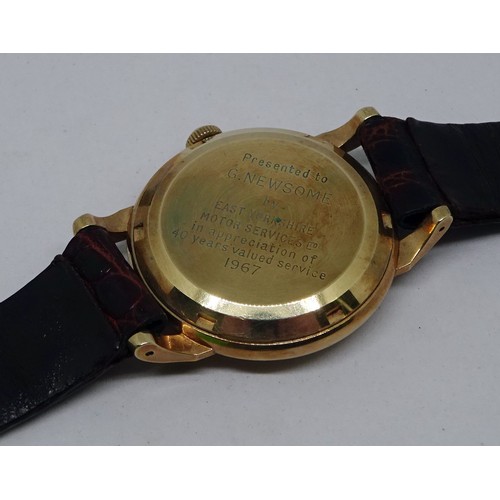 350 - A Garrard wristwatch having an automatic movement in a 9ct gold case with a screw-down solid back, b... 