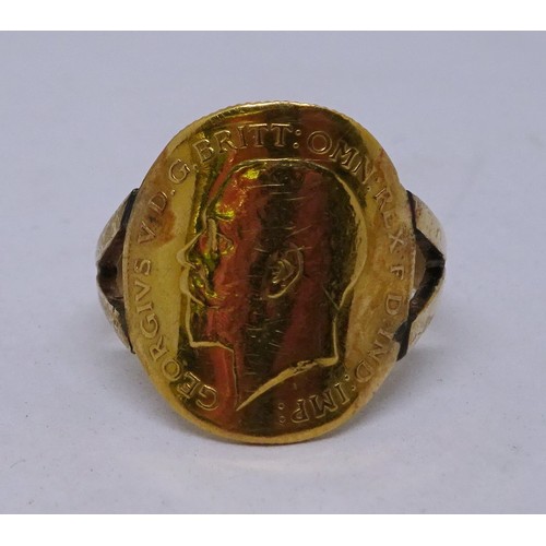 355 - A ring being a George V 1912 half sovereign curved and soldered onto an indistinctly marked yellow m... 