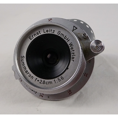 39 - A Leica ii rangefinder camera c1933 having chrome finish with body cap; a Leitz Summaron 2.8cm lens ... 