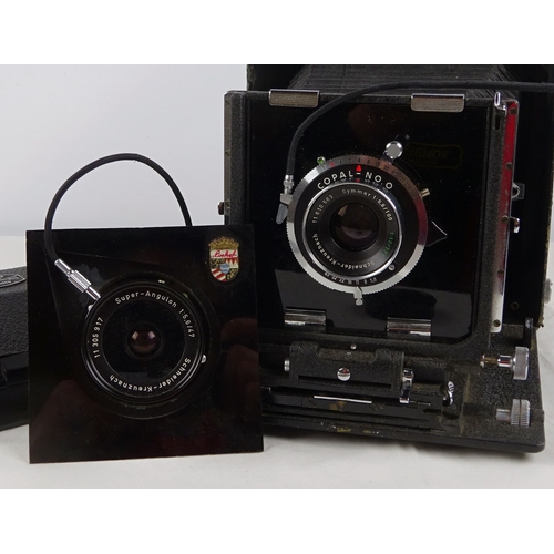 43 - A large format camera having a Schneider-Kreuznach Symmar 100mm lens with Copal shutter, a Schneider... 