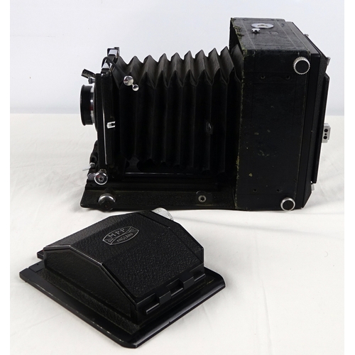 43 - A large format camera having a Schneider-Kreuznach Symmar 100mm lens with Copal shutter, a Schneider... 