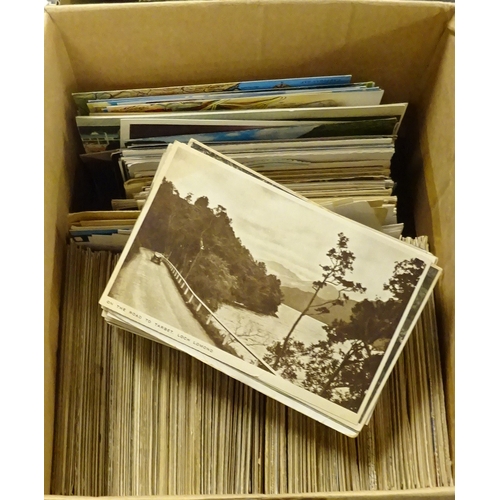 160 - Four boxes of postcards