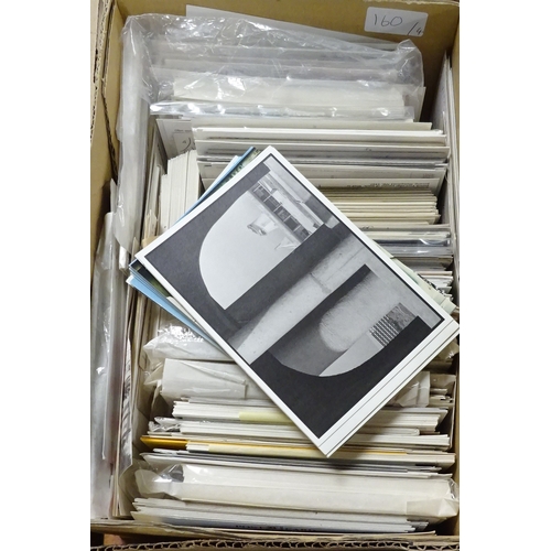 160 - Four boxes of postcards