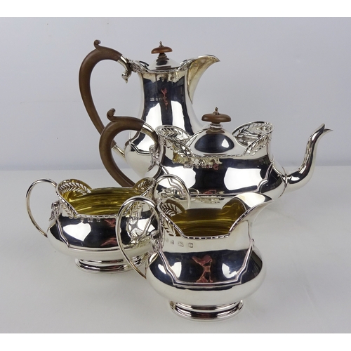 368 - A four piece silver teaset Fattorini & Sons, Birmingham 1916 & 1920.  Teapot 285mm long / 1800gr gro... 