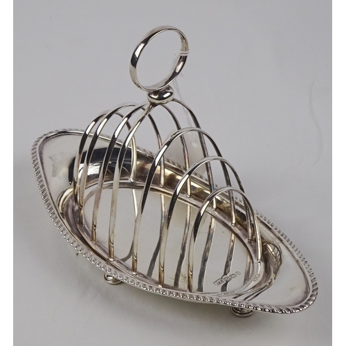 371 - A silver toast rack, Sheffield 1896.  206mm long / 240gr