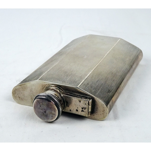 387 - A silver hip flask having engine turned decoration, Birmingham 1946.  135mm tall / 190gr