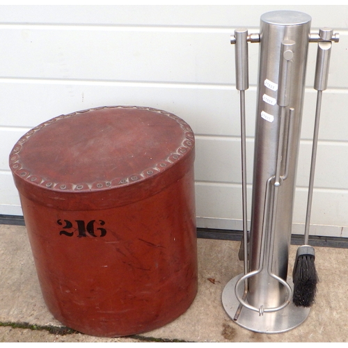 539 - A modern stainless steel companion set together with a circular lidded box, numbered 216.