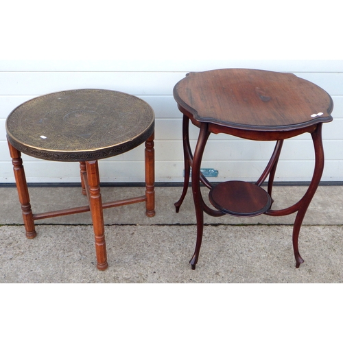 599 - An Edwardian mahogany occasional table (AF) together with a brass top folding table. (2)