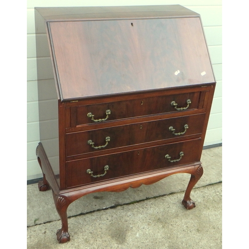 655 - A 1930's mahogany claw and ball bureau. 77cm wide.