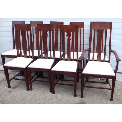 710 - A set of eight plus 1 oak arts and crafts style dining chairs. 115cm high (9)