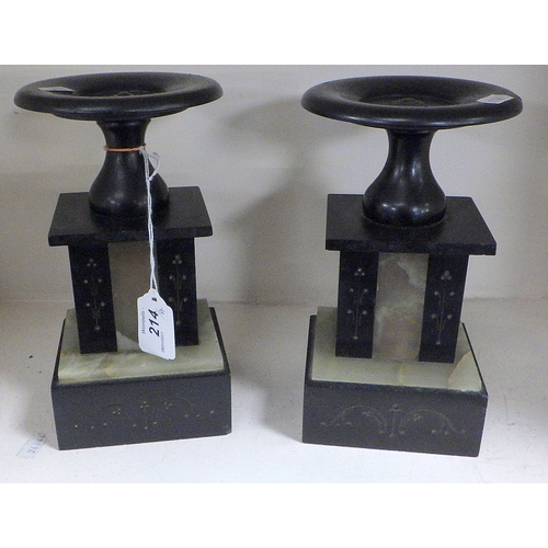 214 - A pair of small slate pedestals or garnitures 22cm high.