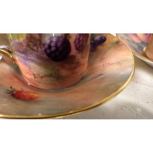 228 - Two small Royal Worcester painted fruits cups and saucers.