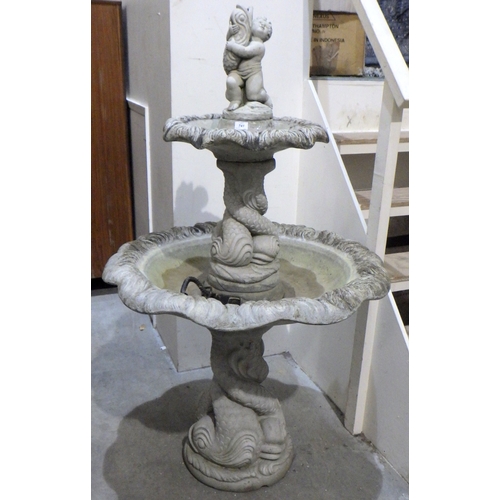 741 - A two tier sectional concrete garden fountain approx 160cm tall 98cm wide