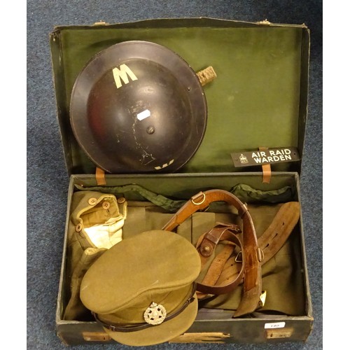 140 - An ARP warden's steel helmet and brass ARP post name plate together with a part Rifle Brigade Office... 