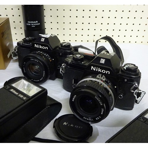 44 - Two Nikon EM 35mm SLR film cameras, a collection of Nikon prime-lenses incl E Series 28mm & 50mm, Ni... 