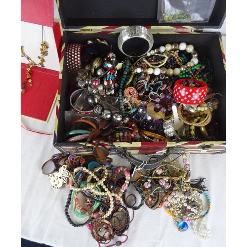 54 - A large quantity of various costume jewellery in a modern Union Jack case.