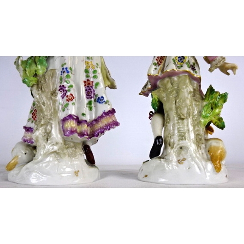 61 - A pair of Chelsea figurines 24cm tall (damaged) together with various ceramics to include cabinet pl... 