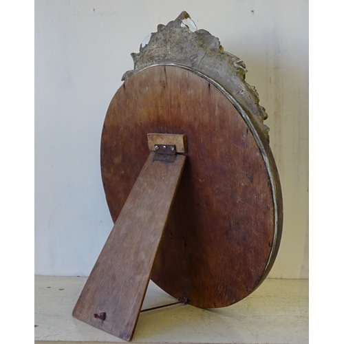 48 - A Barbola round bevelled easel mirror 34cm wide af repairs.